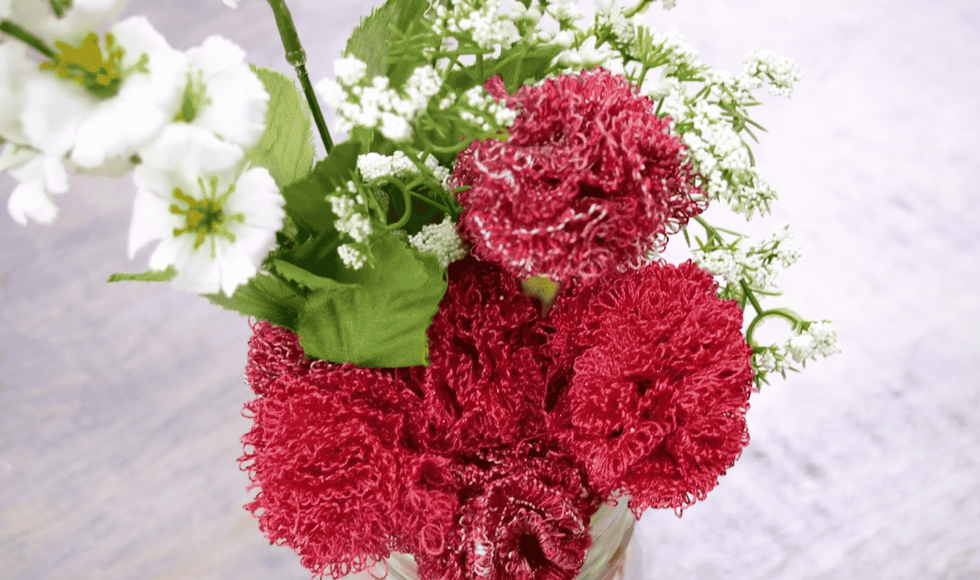 A bouquet of red flowers

Description automatically generated with medium confidence