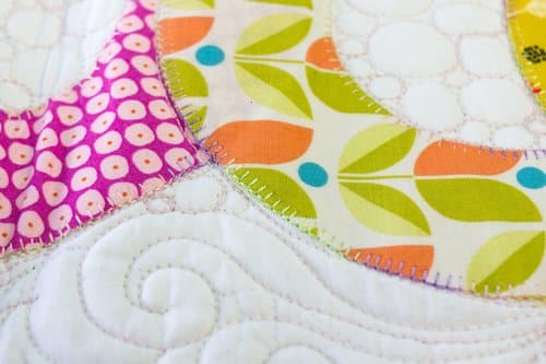 Use Fruitti™ to incorporate colour when doing free-motion longarm quilting.