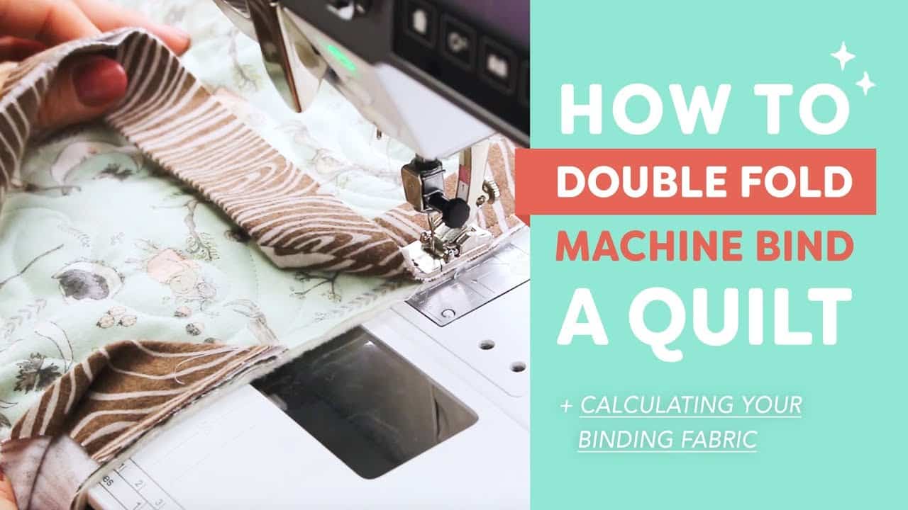 A picture of double fold machine binding a quilt with a sewing machine.
