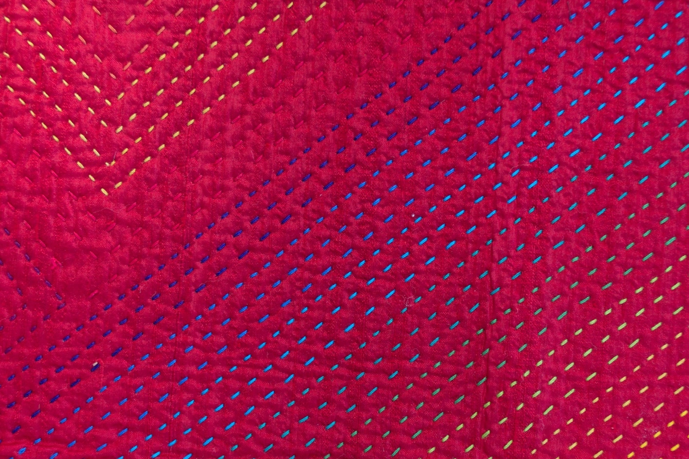 A picture containing red, close, fabric Description automatically generated